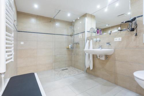 Ένα μπάνιο στο Haus Meeresbrise - Ferienwohnung 04 Strandnah