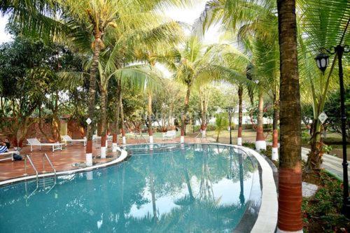 The swimming pool at or close to Lake View Holiday Villa Near Sula Wine Yard With 3 BdRms