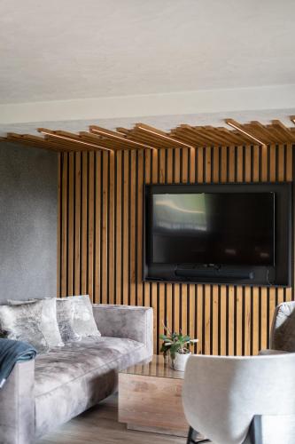 TV a/nebo společenská místnost v ubytování Purest