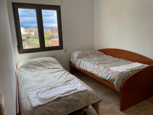 Postel nebo postele na pokoji v ubytování Casa La Fuente