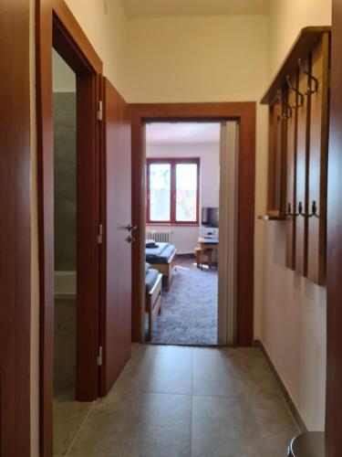 Postel nebo postele na pokoji v ubytování hotel KORUNA