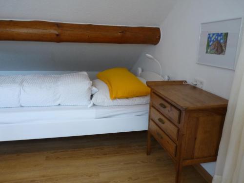 Кровать или кровати в номере Ferienhaus Barbarasegen