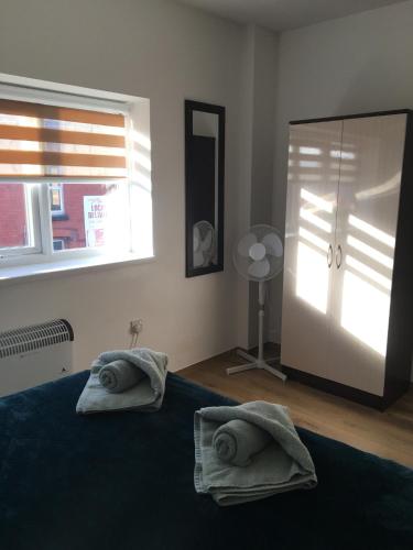 Postel nebo postele na pokoji v ubytování Modern 1 bedroom flat perfect for match or city break
