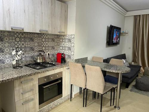 Η κουζίνα ή μικρή κουζίνα στο Appartement perla saidia