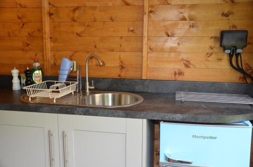 A kitchen or kitchenette at Stamford Meadows Glamping with Private Hot Tubs