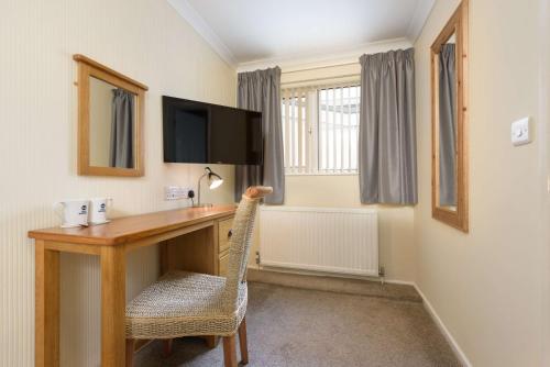 Best Western Fowey Valleyにあるテレビまたはエンターテインメントセンター