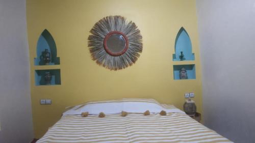 Giường trong phòng chung tại Ijoukak Berber HomeStay