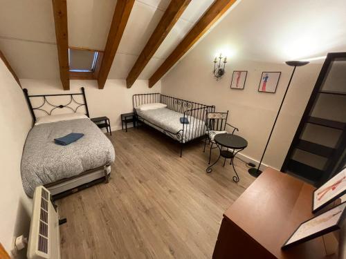 Postel nebo postele na pokoji v ubytování Ático Dúplex Alemar