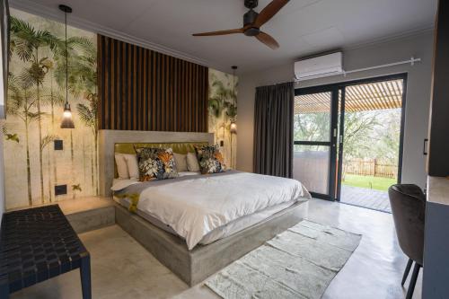 Postel nebo postele na pokoji v ubytování Muunga Bush Lodge & Spa