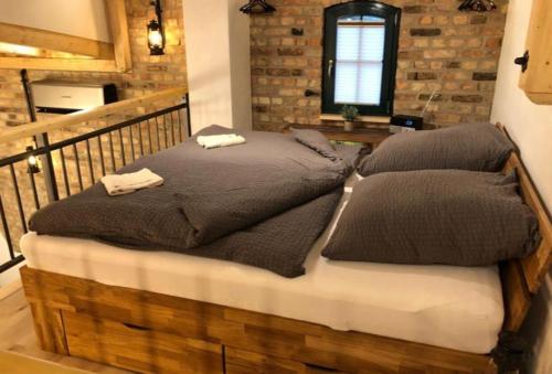 two pillows on a bed in a room at Stolpseeblick in Himmelpfort