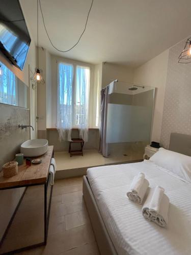 Krevet ili kreveti u jedinici u okviru objekta Locanda Garzelli