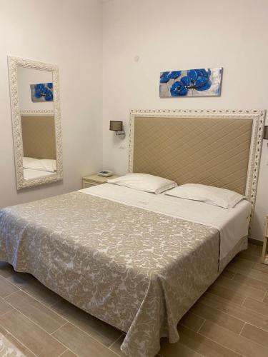 מיטה או מיטות בחדר ב-Park Hotel Castello