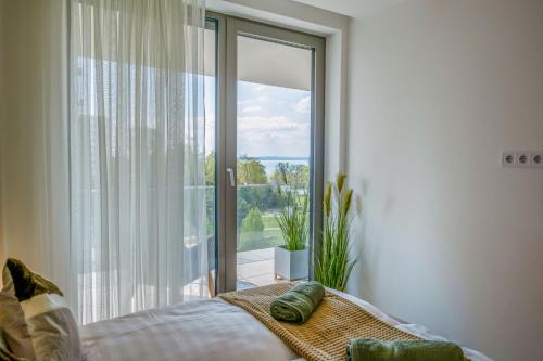 Posteľ alebo postele v izbe v ubytovaní MyFlat Coral 64 Premium Apartment