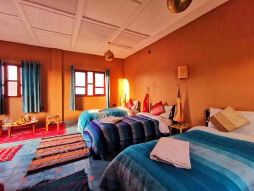 Cama o camas de una habitación en Oasis Tilogui - Luxury hotel in Zagora