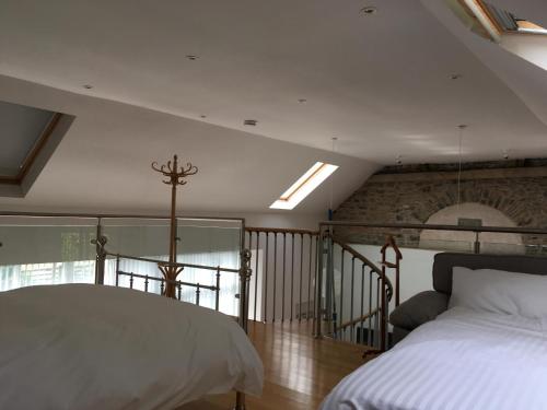 Ένα ή περισσότερα κρεβάτια σε δωμάτιο στο Auld Skuil