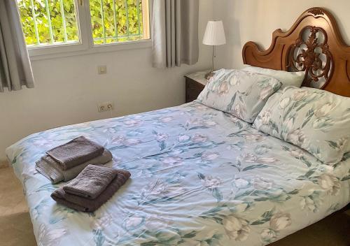 Postel nebo postele na pokoji v ubytování Villa Ardilla