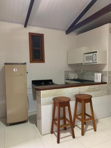 Dapur atau dapur kecil di Pousada O Rancho Alegre