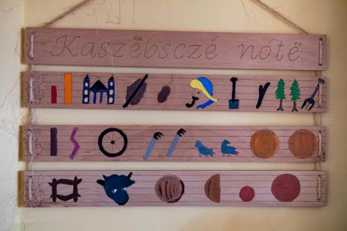 a group of books with the wordsassurance note on them at Kaszubski Dworek in Sznurki