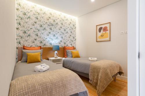 Posteľ alebo postele v izbe v ubytovaní Enchanting Design Flat - Premium Location