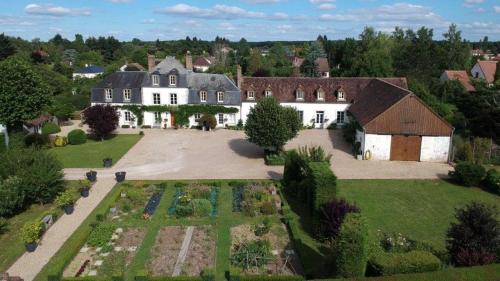 an aerial view of a house with a garden at Domaine de Bel Ebat in Paucourt