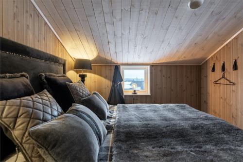 Fjällnära Skilodge 19 tesisinde bir odada yatak veya yataklar