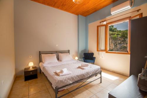 Posteľ alebo postele v izbe v ubytovaní Ntamari Apartments