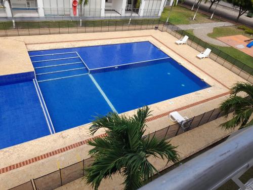 Uitzicht op het zwembad bij Apartamento vacacional of in de buurt