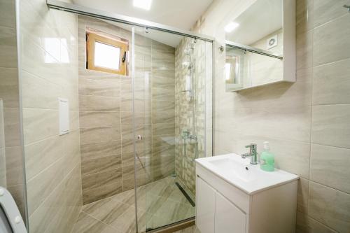 Ванная комната в Апартамент за гости Веси