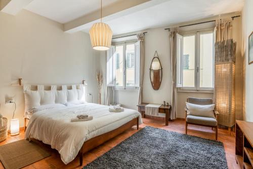 Posteľ alebo postele v izbe v ubytovaní Mercato di Sant'Ambrogio cozy apartment