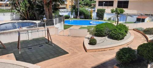Bazén v ubytování Apartamento Marina en Moraira nebo v jeho okolí
