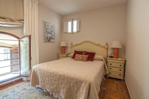 Posteľ alebo postele v izbe v ubytovaní Ático San Juan, Apartamentos Living Sur
