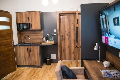 Kuchyň nebo kuchyňský kout v ubytování Hotel Sukcesor