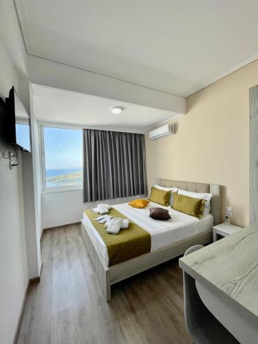 Una cama o camas en una habitación de Relax Mea Hotel