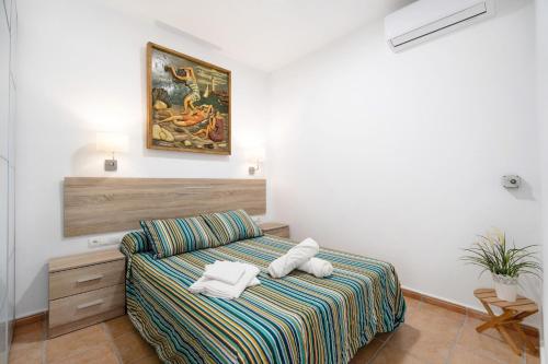Katil atau katil-katil dalam bilik di Apartamento Casa rural el campo