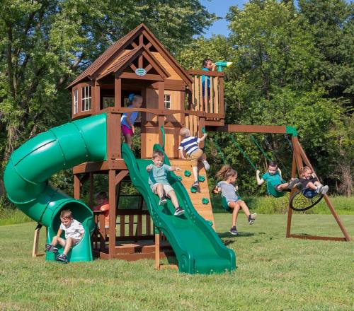 a group of children playing on a playground at Willa Pod Kozińcem in Czarna Góra