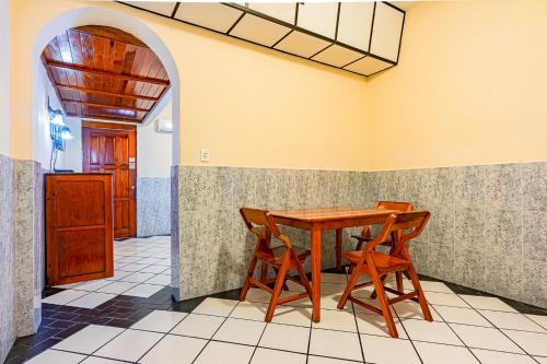 a dining room with a table and two chairs at Privada Guadalupe in Monterrey