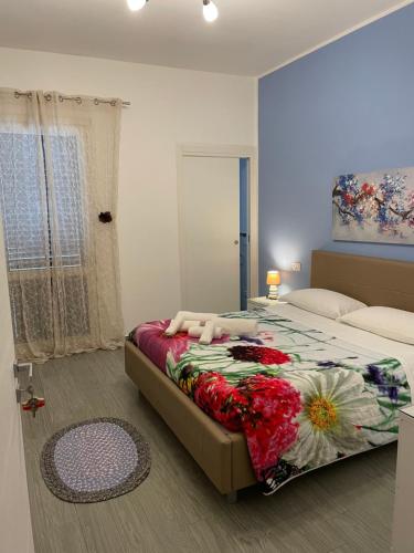 Postel nebo postele na pokoji v ubytování La Rosa Blu