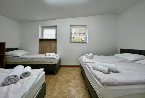 Posteľ alebo postele v izbe v ubytovaní Domek nad Wartą