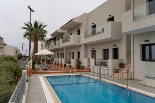 The swimming pool at or close to Aspri Petra Apartments