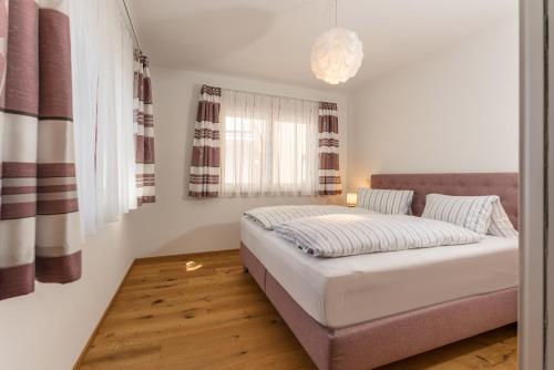 Posteľ alebo postele v izbe v ubytovaní Appartement Alpengefühl am Dachstein