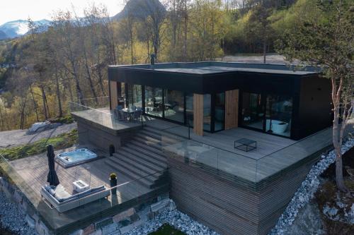 an aerial view of a house in the woods at VILLA KRISTINA / ÅNDALSNES in Torvik
