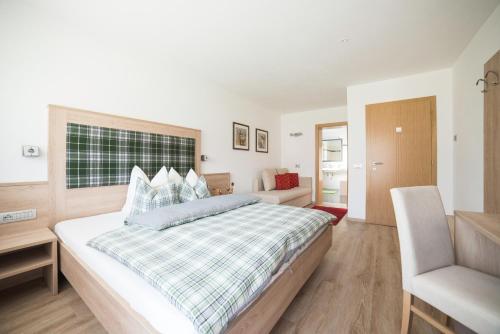 Residence Ravisa Dolomitesにあるベッド