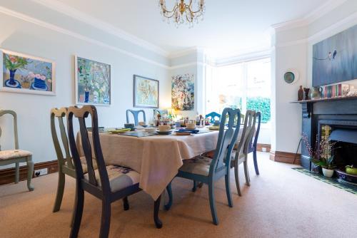 a dining room with a table and chairs at The Mount B&B in Keswick
