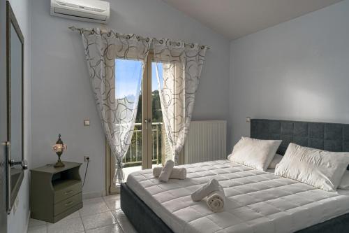 Postel nebo postele na pokoji v ubytování Villa Guesto