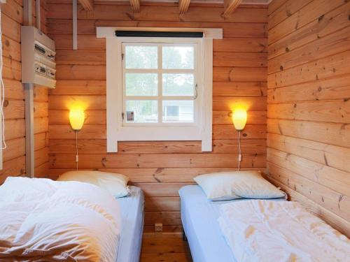 Postel nebo postele na pokoji v ubytování Holiday home Rødby LIII