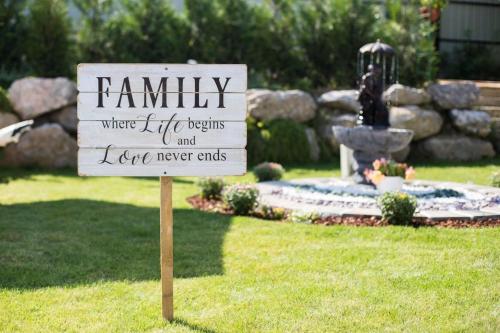 a sign that says family where life begins and love never ends at Cabana Abel in Vama