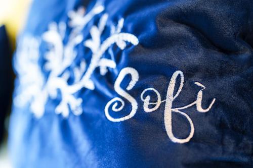 a close up of the word sap written on a shirt at Sofì Sorrento Suites in Sorrento