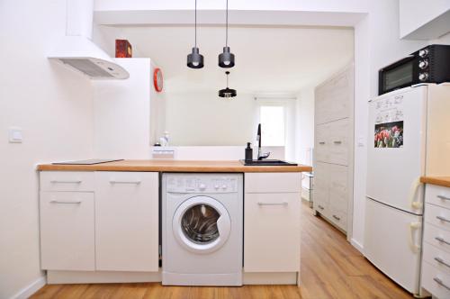 Kuchyňa alebo kuchynka v ubytovaní Seaside Studio Apartment Dworska