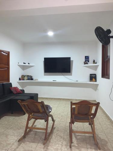 TV tai viihdekeskus majoituspaikassa Hostal Casa W
