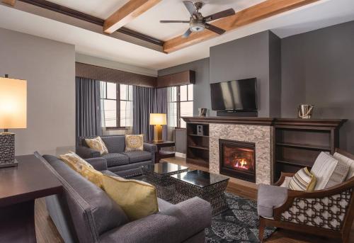 a living room with a couch and a fireplace at Club Wyndham Park City in Park City